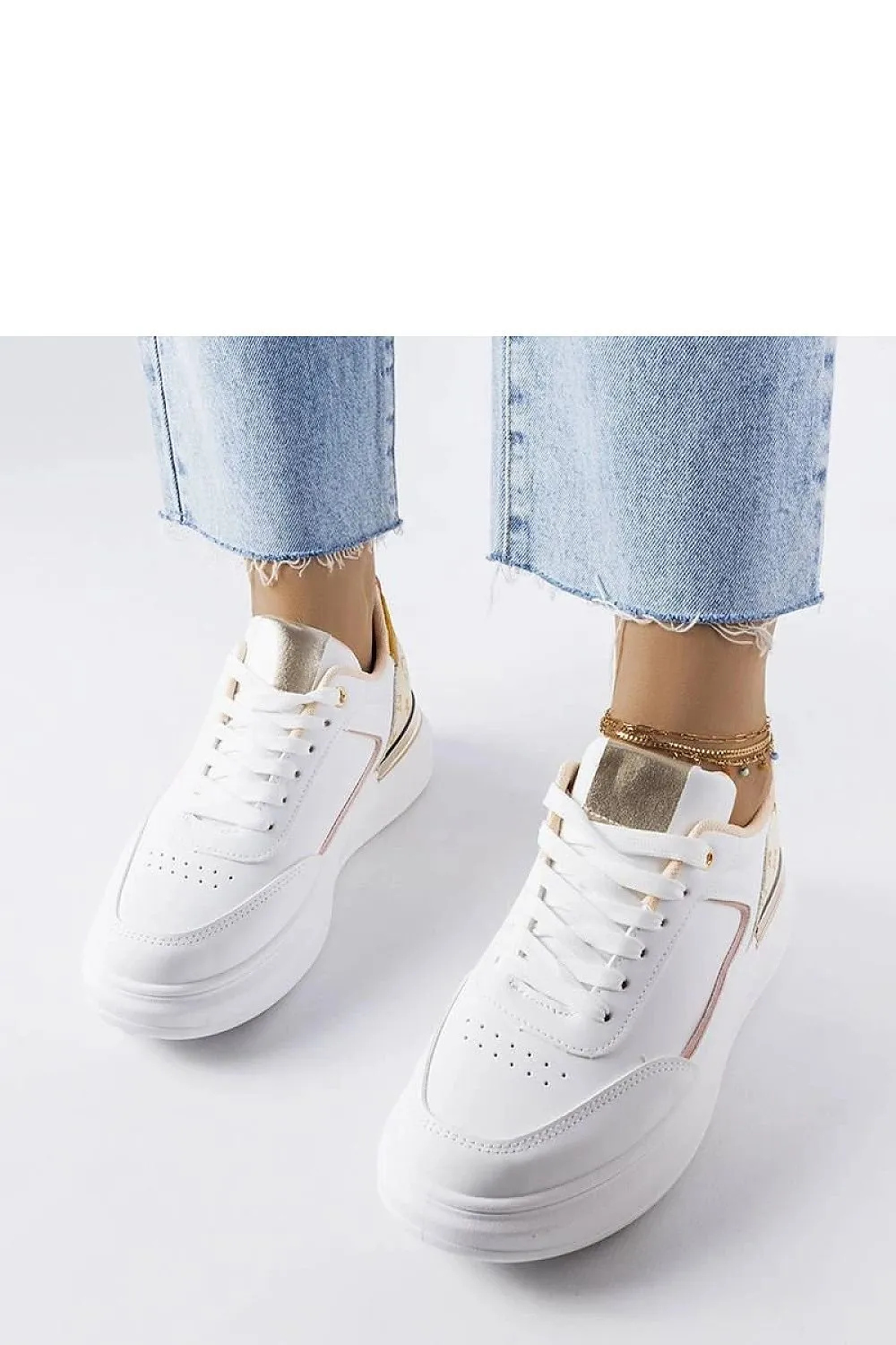 Stylish white sneakers with beige inserts