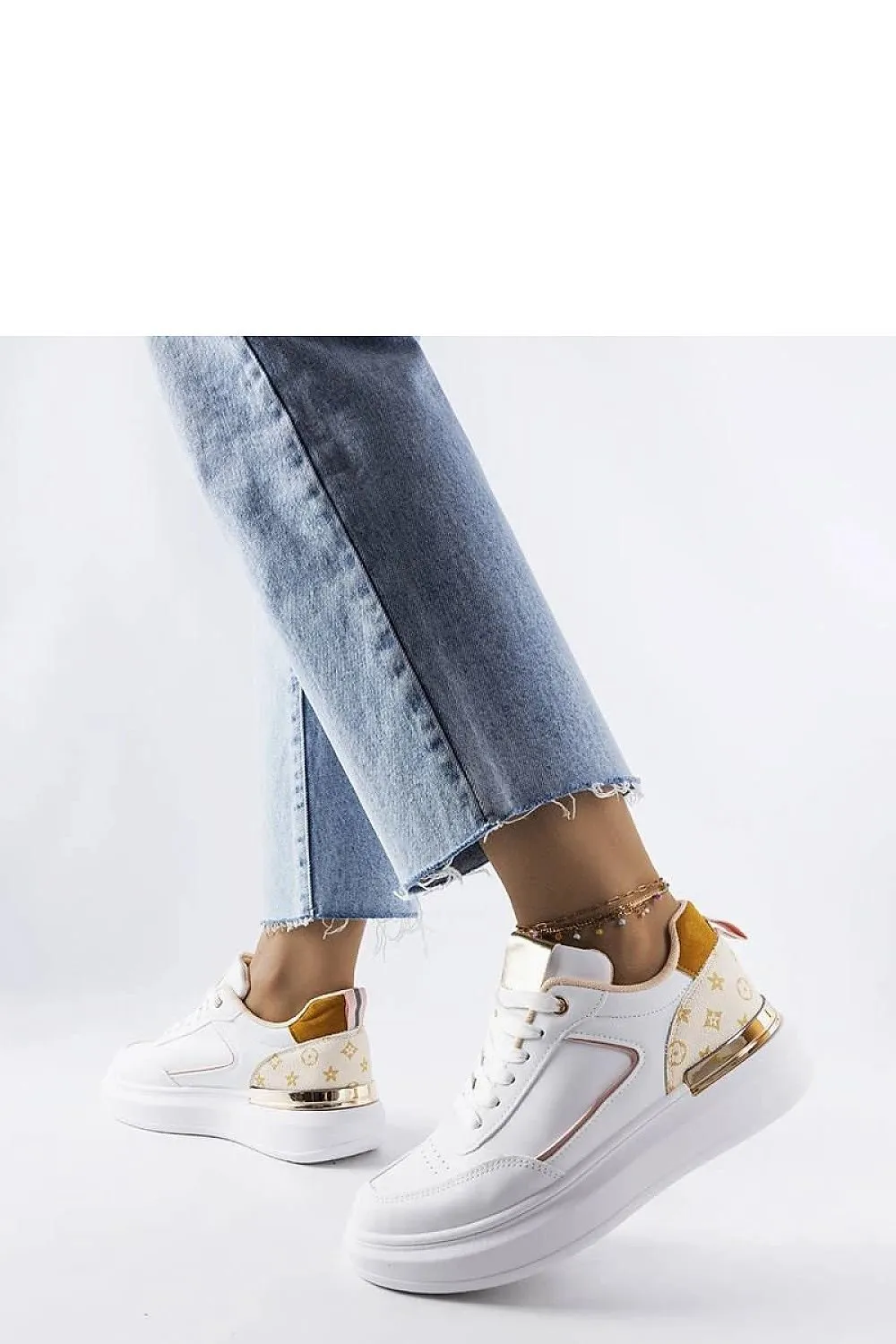 Stylish white sneakers with beige inserts